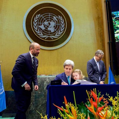 US Secretary of State John Kerry signs the COP21 UN Climate Change agreement. 